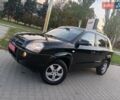 Чорний Хендай Туксон, об'ємом двигуна 1.98 л та пробігом 192 тис. км за 7950 $, фото 1 на Automoto.ua