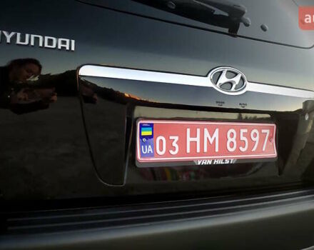 Черный Хендай Туксон, объемом двигателя 2 л и пробегом 230 тыс. км за 8600 $, фото 75 на Automoto.ua