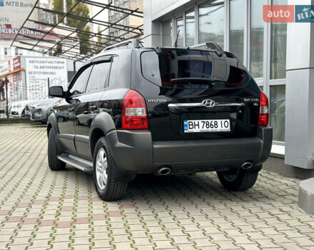 Чорний Хендай Туксон, об'ємом двигуна 2.66 л та пробігом 145 тис. км за 8900 $, фото 3 на Automoto.ua