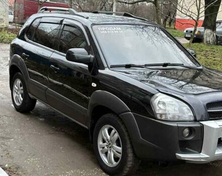 Черный Хендай Туксон, объемом двигателя 1.98 л и пробегом 273 тыс. км за 7400 $, фото 5 на Automoto.ua
