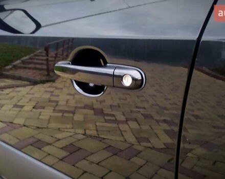 Чорний Хендай Туксон, об'ємом двигуна 2 л та пробігом 229 тис. км за 8600 $, фото 89 на Automoto.ua