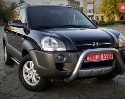 Черный Хендай Туксон, объемом двигателя 2 л и пробегом 230 тыс. км за 8600 $, фото 25 на Automoto.ua