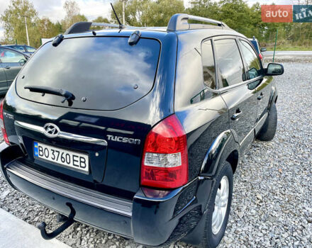 Черный Хендай Туксон, объемом двигателя 2 л и пробегом 224 тыс. км за 7750 $, фото 10 на Automoto.ua