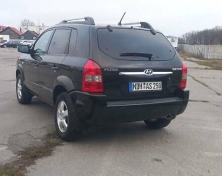 Черный Хендай Туксон, объемом двигателя 1.98 л и пробегом 155 тыс. км за 7999 $, фото 9 на Automoto.ua