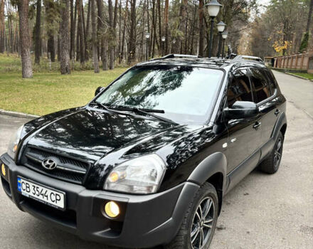 Черный Хендай Туксон, объемом двигателя 1.99 л и пробегом 266 тыс. км за 7500 $, фото 11 на Automoto.ua