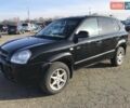 Черный Хендай Туксон, объемом двигателя 2 л и пробегом 180 тыс. км за 9200 $, фото 2 на Automoto.ua