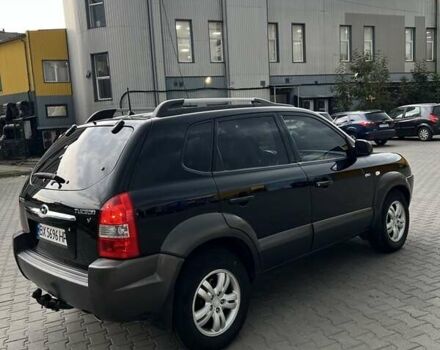Черный Хендай Туксон, объемом двигателя 2.7 л и пробегом 266 тыс. км за 7700 $, фото 5 на Automoto.ua