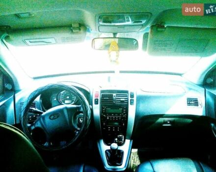 Черный Хендай Туксон, объемом двигателя 2 л и пробегом 218 тыс. км за 7700 $, фото 5 на Automoto.ua