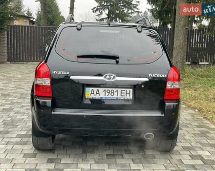Черный Хендай Туксон, объемом двигателя 2 л и пробегом 180 тыс. км за 7700 $, фото 14 на Automoto.ua
