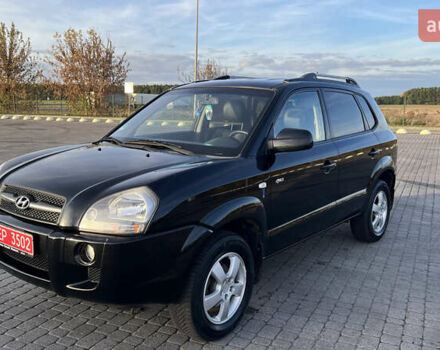 Черный Хендай Туксон, объемом двигателя 1.98 л и пробегом 243 тыс. км за 8500 $, фото 12 на Automoto.ua
