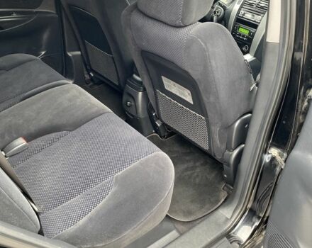 Черный Хендай Туксон, объемом двигателя 2 л и пробегом 330 тыс. км за 4350 $, фото 21 на Automoto.ua