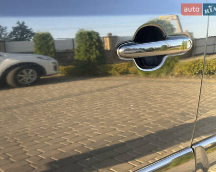 Черный Хендай Туксон, объемом двигателя 2 л и пробегом 270 тыс. км за 8200 $, фото 6 на Automoto.ua