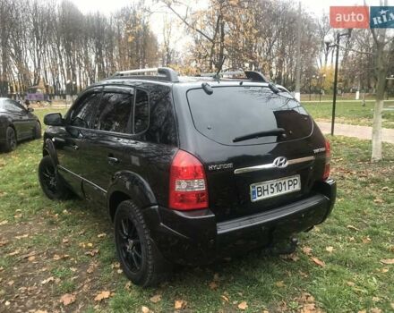 Черный Хендай Туксон, объемом двигателя 2 л и пробегом 210 тыс. км за 8999 $, фото 29 на Automoto.ua