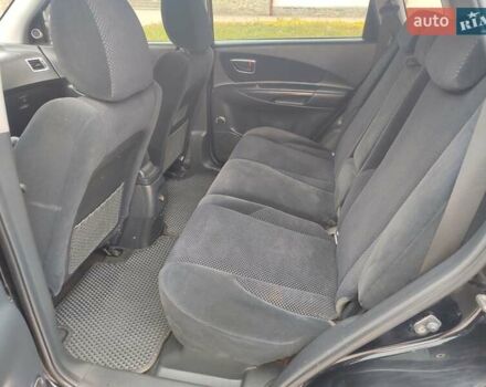 Черный Хендай Туксон, объемом двигателя 2 л и пробегом 270 тыс. км за 6800 $, фото 14 на Automoto.ua