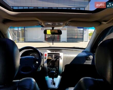 Хендай Туксон 2007 в Запорожье на Automoto.ua Черный Хендай Туксон, объемом двигателя 2.66 л и пробегом 200 тыс. км за 8900 $, фото 12 на Automoto.ua