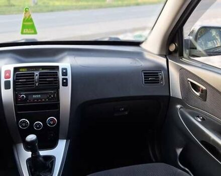 Черный Хендай Туксон, объемом двигателя 2 л и пробегом 190 тыс. км за 8150 $, фото 32 на Automoto.ua