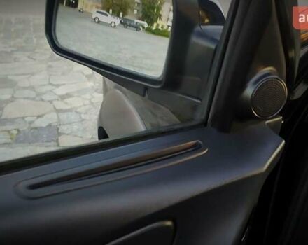 Черный Хендай Туксон, объемом двигателя 2 л и пробегом 230 тыс. км за 8600 $, фото 175 на Automoto.ua