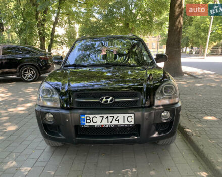 Черный Хендай Туксон, объемом двигателя 1.98 л и пробегом 232 тыс. км за 9100 $, фото 2 на Automoto.ua
