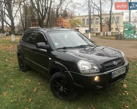 Черный Хендай Туксон, объемом двигателя 2 л и пробегом 210 тыс. км за 8999 $, фото 16 на Automoto.ua