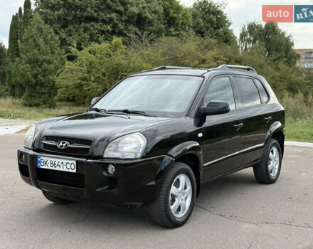 Черный Хендай Туксон, объемом двигателя 2 л и пробегом 300 тыс. км за 7350 $, фото 10 на Automoto.ua