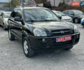 Чорний Хендай Туксон, об'ємом двигуна 2 л та пробігом 180 тис. км за 7999 $, фото 1 на Automoto.ua