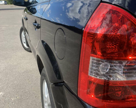 Чорний Хендай Туксон, об'ємом двигуна 2 л та пробігом 56 тис. км за 9500 $, фото 31 на Automoto.ua