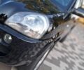 Чорний Хендай Туксон, об'ємом двигуна 2 л та пробігом 190 тис. км за 8300 $, фото 6 на Automoto.ua