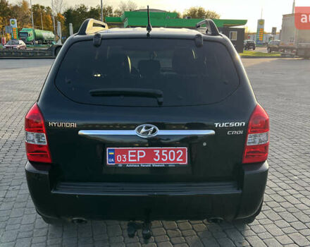 Черный Хендай Туксон, объемом двигателя 1.98 л и пробегом 243 тыс. км за 8500 $, фото 11 на Automoto.ua