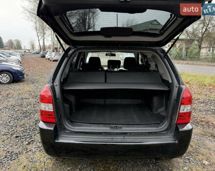 Чорний Хендай Туксон, об'ємом двигуна 2 л та пробігом 196 тис. км за 7250 $, фото 24 на Automoto.ua