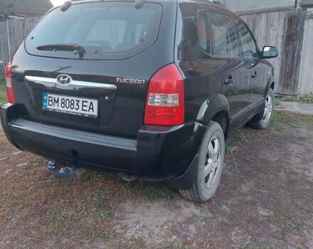 Черный Хендай Туксон, объемом двигателя 1.98 л и пробегом 200 тыс. км за 7100 $, фото 8 на Automoto.ua