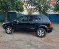Черный Хендай Туксон, объемом двигателя 2 л и пробегом 219 тыс. км за 7990 $, фото 39 на Automoto.ua