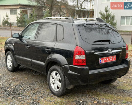 Чорний Хендай Туксон, об'ємом двигуна 2 л та пробігом 196 тис. км за 7250 $, фото 10 на Automoto.ua