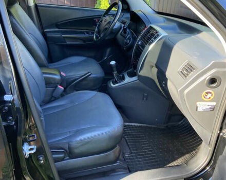 Черный Хендай Туксон, объемом двигателя 1.98 л и пробегом 197 тыс. км за 8000 $, фото 29 на Automoto.ua