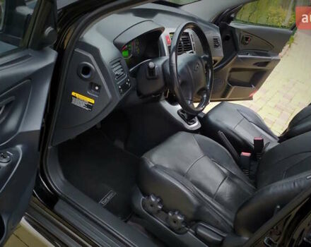 Чорний Хендай Туксон, об'ємом двигуна 2 л та пробігом 229 тис. км за 8600 $, фото 104 на Automoto.ua