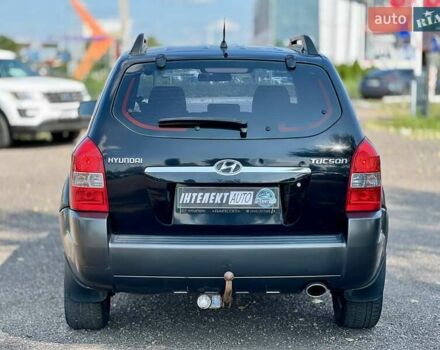 Черный Хендай Туксон, объемом двигателя 2 л и пробегом 227 тыс. км за 8200 $, фото 4 на Automoto.ua