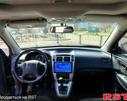 Чорний Хендай Туксон, об'ємом двигуна 2 л та пробігом 350 тис. км за 7500 $, фото 2 на Automoto.ua