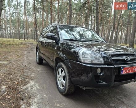 Черный Хендай Туксон, объемом двигателя 2 л и пробегом 198 тыс. км за 7800 $, фото 1 на Automoto.ua