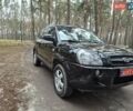 Черный Хендай Туксон, объемом двигателя 2 л и пробегом 198 тыс. км за 7800 $, фото 1 на Automoto.ua