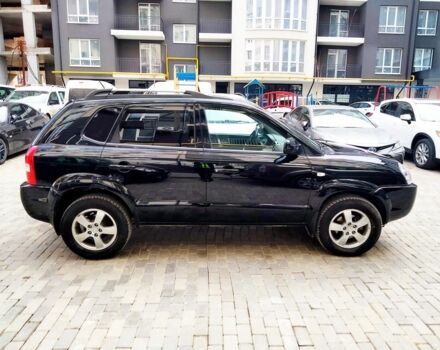 Чорний Хендай Туксон, об'ємом двигуна 2 л та пробігом 190 тис. км за 7500 $, фото 4 на Automoto.ua