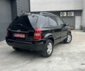 Черный Хендай Туксон, объемом двигателя 2 л и пробегом 179 тыс. км за 8000 $, фото 2 на Automoto.ua