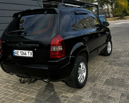 Чорний Хендай Туксон, об'ємом двигуна 2 л та пробігом 253 тис. км за 9428 $, фото 4 на Automoto.ua