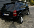 Чорний Хендай Туксон, об'ємом двигуна 2 л та пробігом 253 тис. км за 9428 $, фото 4 на Automoto.ua