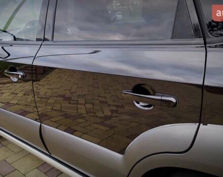 Чорний Хендай Туксон, об'ємом двигуна 2 л та пробігом 229 тис. км за 8600 $, фото 85 на Automoto.ua