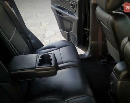 Черный Хендай Туксон, объемом двигателя 2 л и пробегом 230 тыс. км за 8600 $, фото 185 на Automoto.ua