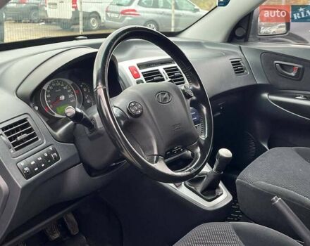 Черный Хендай Туксон, объемом двигателя 2 л и пробегом 163 тыс. км за 7690 $, фото 20 на Automoto.ua