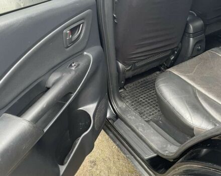 Чорний Хендай Туксон, об'ємом двигуна 2 л та пробігом 230 тис. км за 5999 $, фото 7 на Automoto.ua