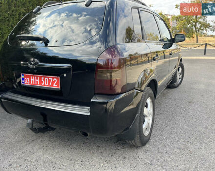 Черный Хендай Туксон, объемом двигателя 2 л и пробегом 256 тыс. км за 7800 $, фото 9 на Automoto.ua