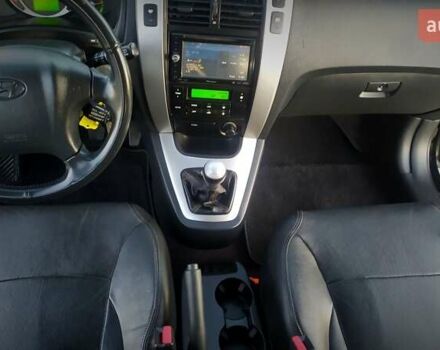 Черный Хендай Туксон, объемом двигателя 2 л и пробегом 230 тыс. км за 8600 $, фото 161 на Automoto.ua