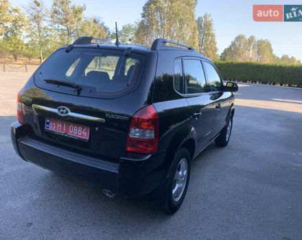 Чорний Хендай Туксон, об'ємом двигуна 2 л та пробігом 56 тис. км за 9500 $, фото 6 на Automoto.ua