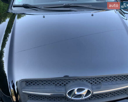 Чорний Хендай Туксон, об'ємом двигуна 2 л та пробігом 56 тис. км за 9500 $, фото 24 на Automoto.ua